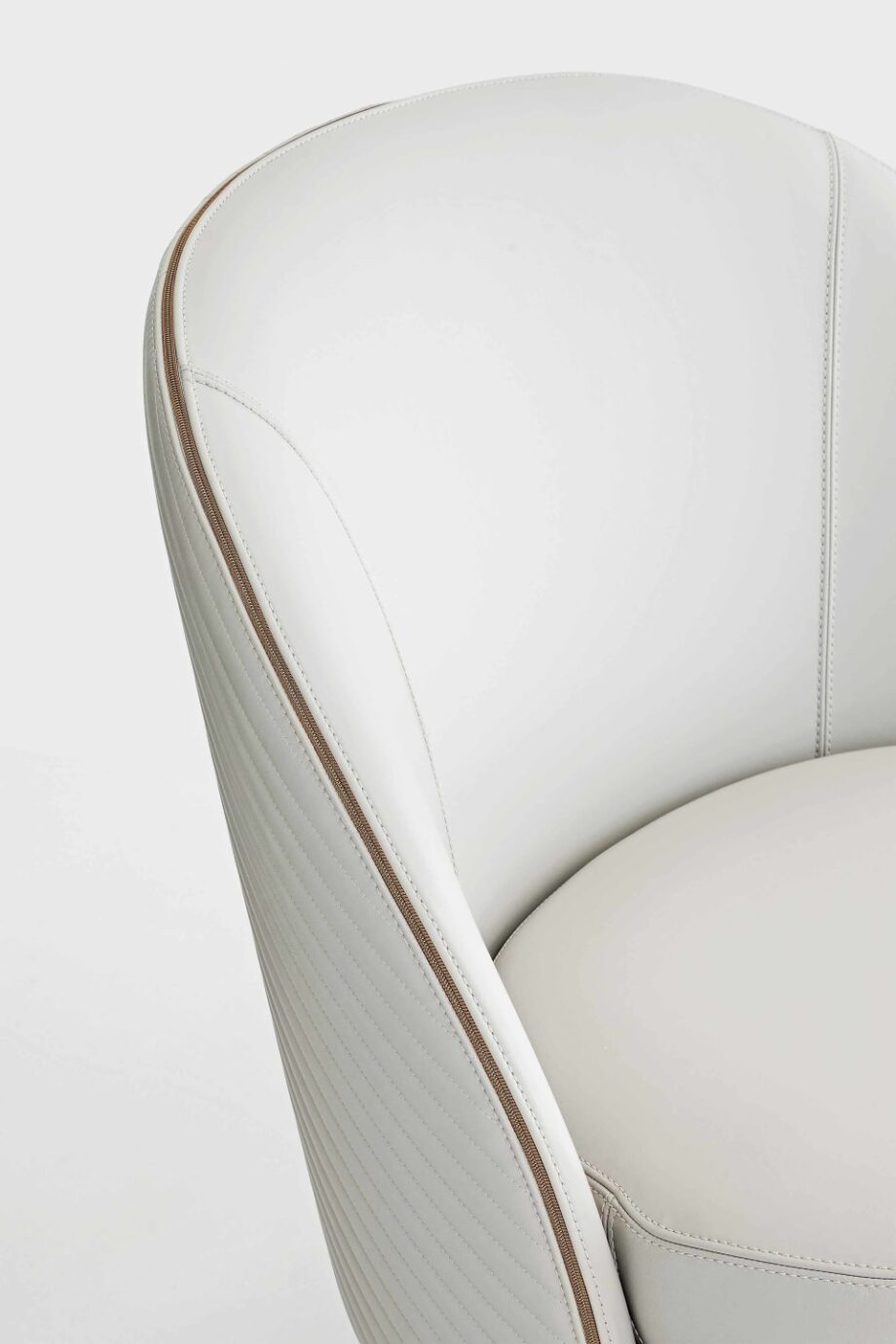 Perla armchair | Rugiano. Elegant upholstered armchair with metal feet, available with patterned stitching, perfect for modern interiors.