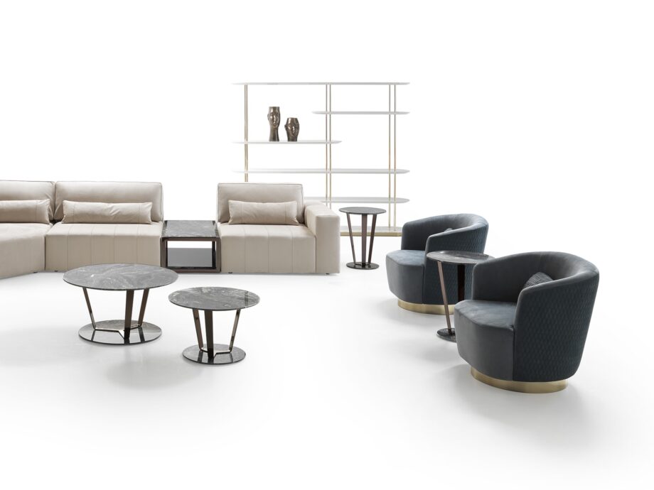 Coco Large armchair | DV home. Luxurious Art Deco swivel armchair with a polished stainless steel base and plush upholstery.