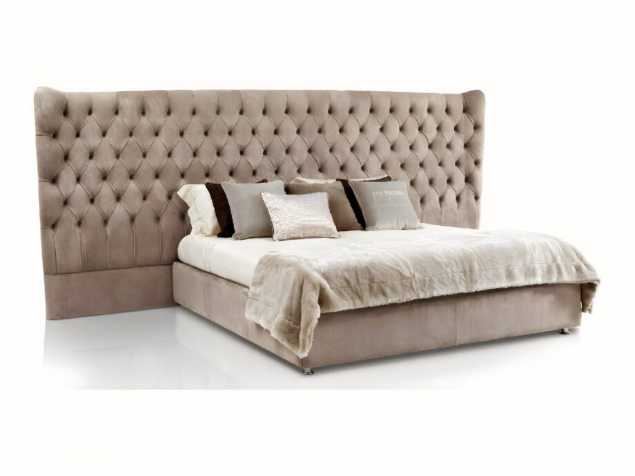 Vogue Maxi bed | DV home. Luxurious bed with a high, tufted headboard, offering unparalleled comfort and a grand, elegant presence.