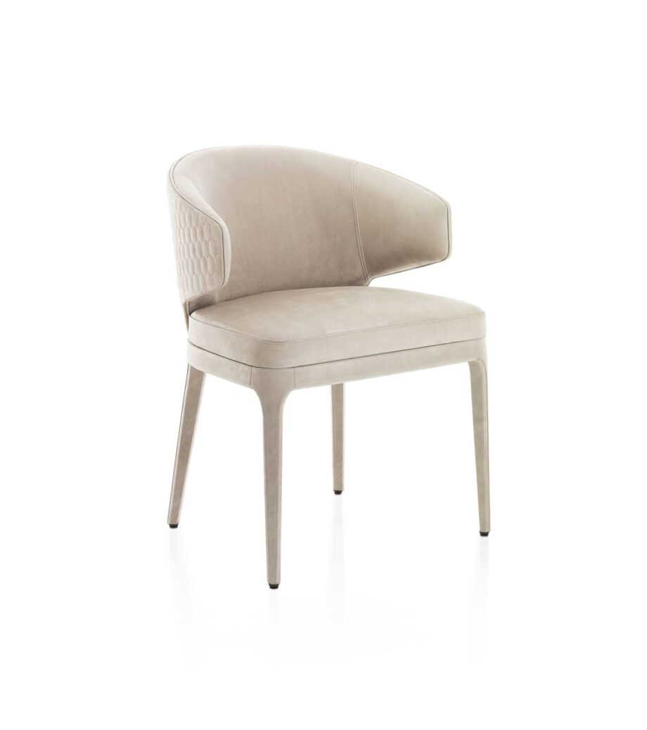 Egoist chair | DV home. Luxurious upholstered chair with a distinctive hexagon quilted back, offering exceptional comfort and refined Italian design.