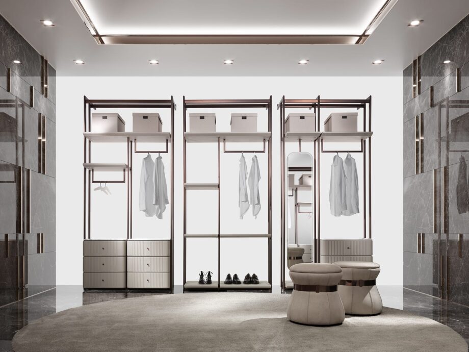 Hollywood closet | DV home. Luxurious Art Deco walk-in closet with brushed stainless steel structure and exquisite leather-covered shelves.
