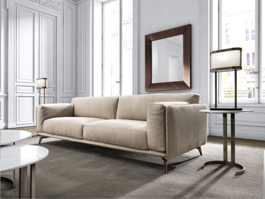 Elite sofa | DV home. Luxuriously crafted sofa with goose feather cushions and elegant metal feet, offering exceptional comfort and sophisticated design.