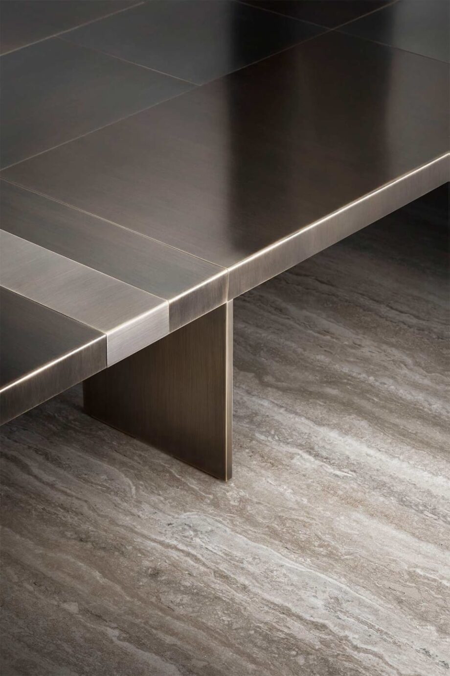 Field coffee table | Rugiano. Exquisite coffee table with a hand-brushed bronze top, creating a captivating interplay of light and geometry.