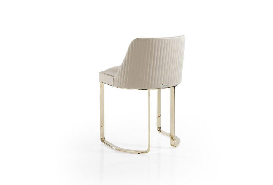 Coco Cannetè chair | DV home. Elegant Italian chair with quilted armrests, chrome base, offering refined design and exceptional comfort for luxurious interiors.