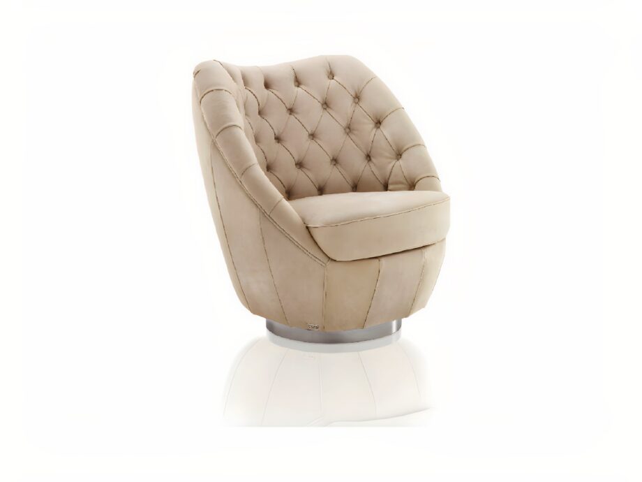 Royal Capitonne' armchair | DV home. Luxurious swivel armchair with exquisite tufted upholstery and a polished steel base.