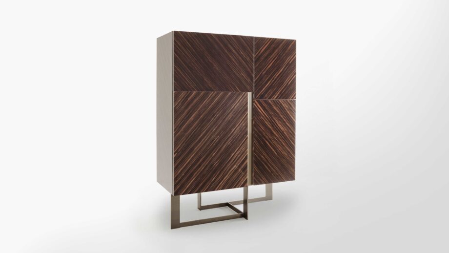 Blade bar cabinet | Rugiano. Elegant bar cabinet with a distinctive geometric patterned facade, perfect for sophisticated interiors.