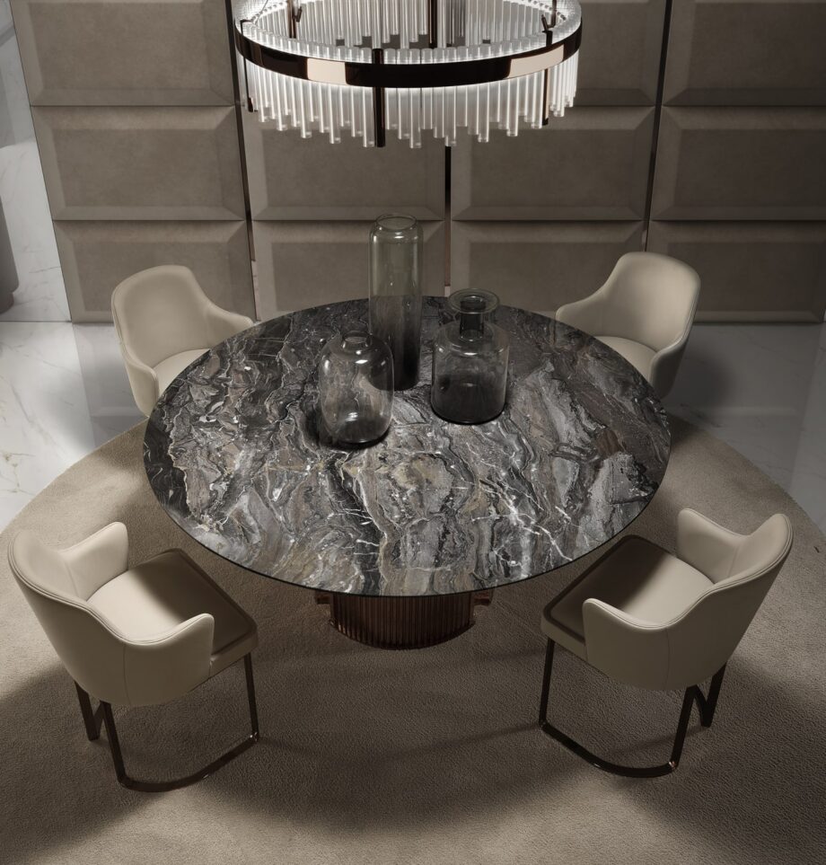 Ritz Low chair | DV home. Designer armchair with soft quilted armrests and a shining chrome base.
