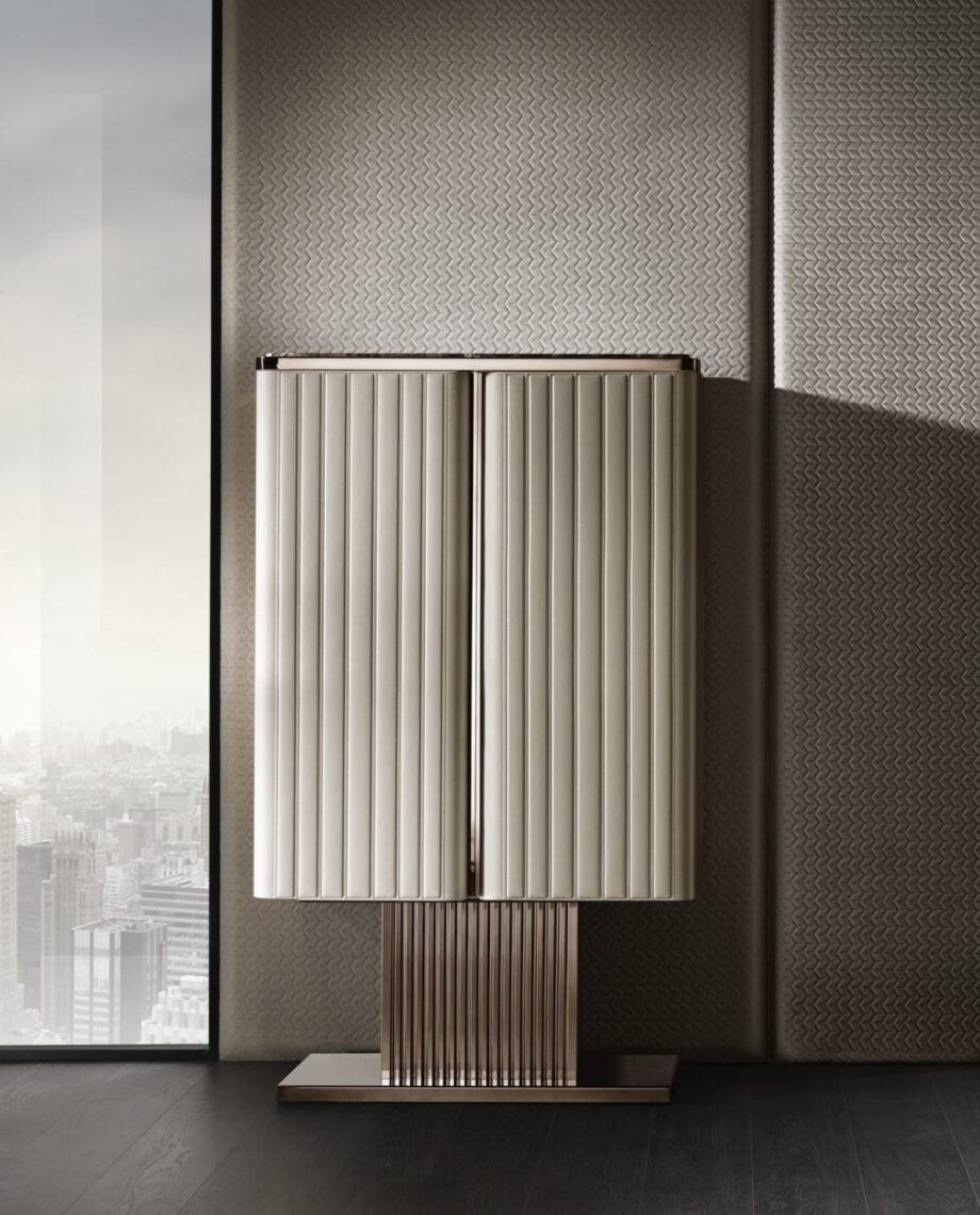 Elite bar cabinet | DV home. Exquisite Art Deco bar cabinet with backlit mirror back, crystal shelves, and luxurious leather upholstery.