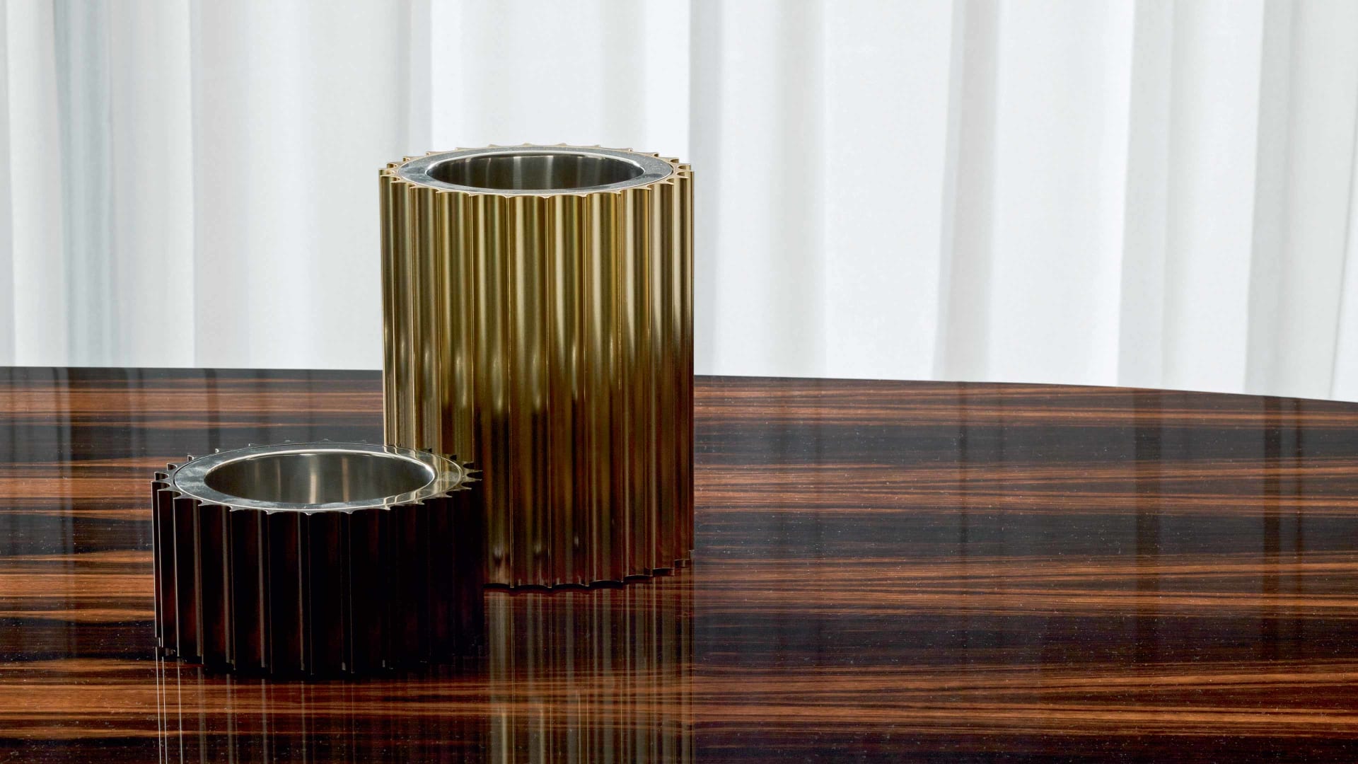 Liberty decorative object | Rugiano. Exquisite metal object with geometric fluting, adding luxury and modern chic to any interior.