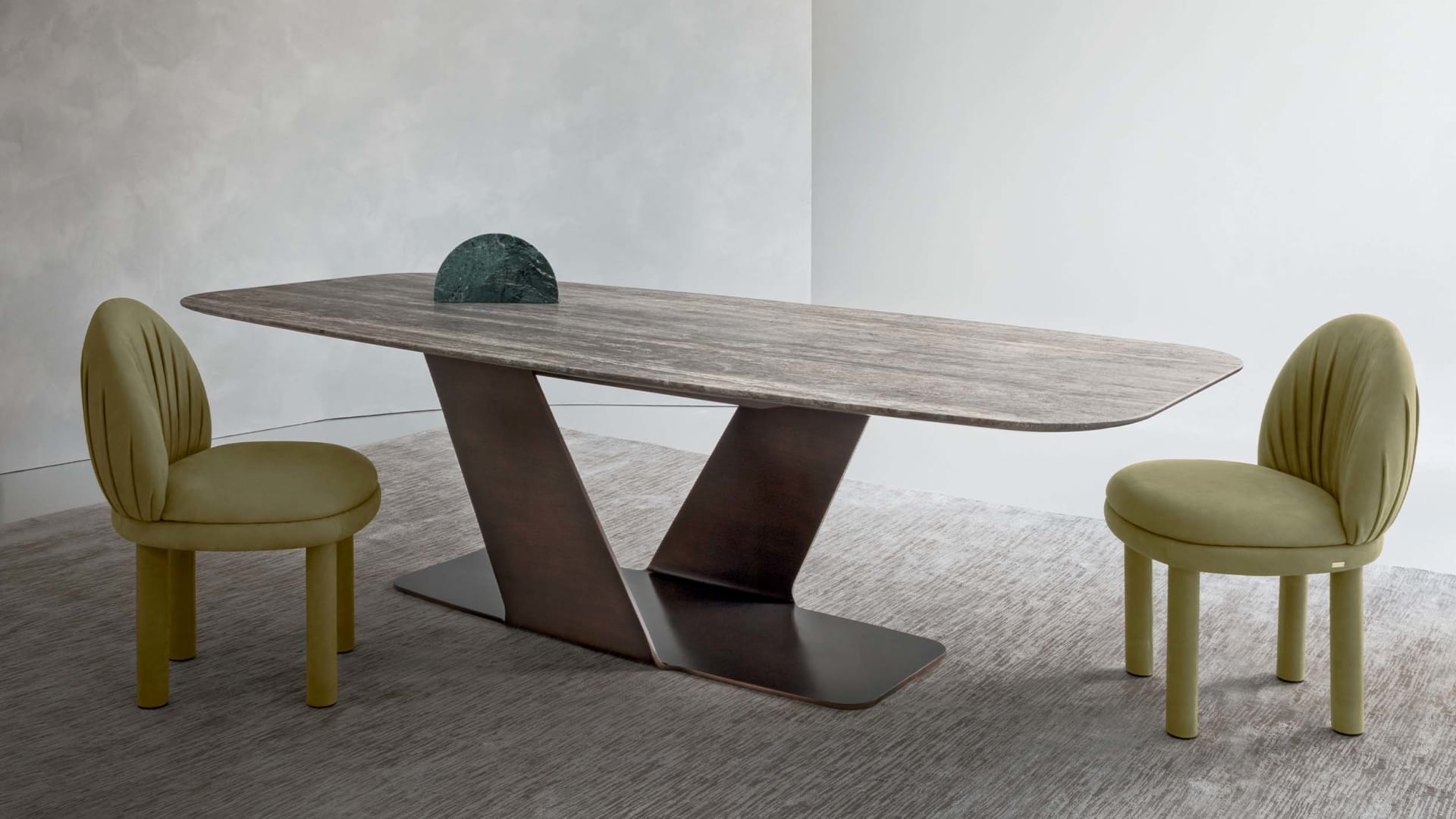 Wally table | Rugiano. A masterpiece of design, featuring a sculptural base and exquisite natural stone top, enhanced by distinctive decoration.