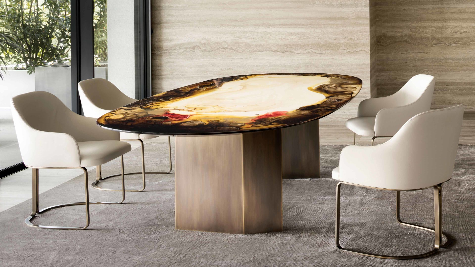 Marie chair | Rugiano. Upholstered chair with a sleek silhouette and elegant bronze base, perfect for modern interiors.