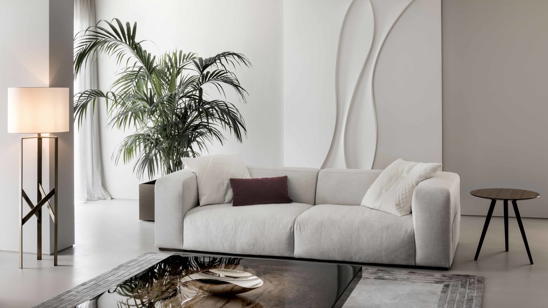 Freud armchair | Rugiano. Modular sofa and armchair range with distinctive baguette stitching and integrated side tables, offering ultimate comfort and design flexibility.