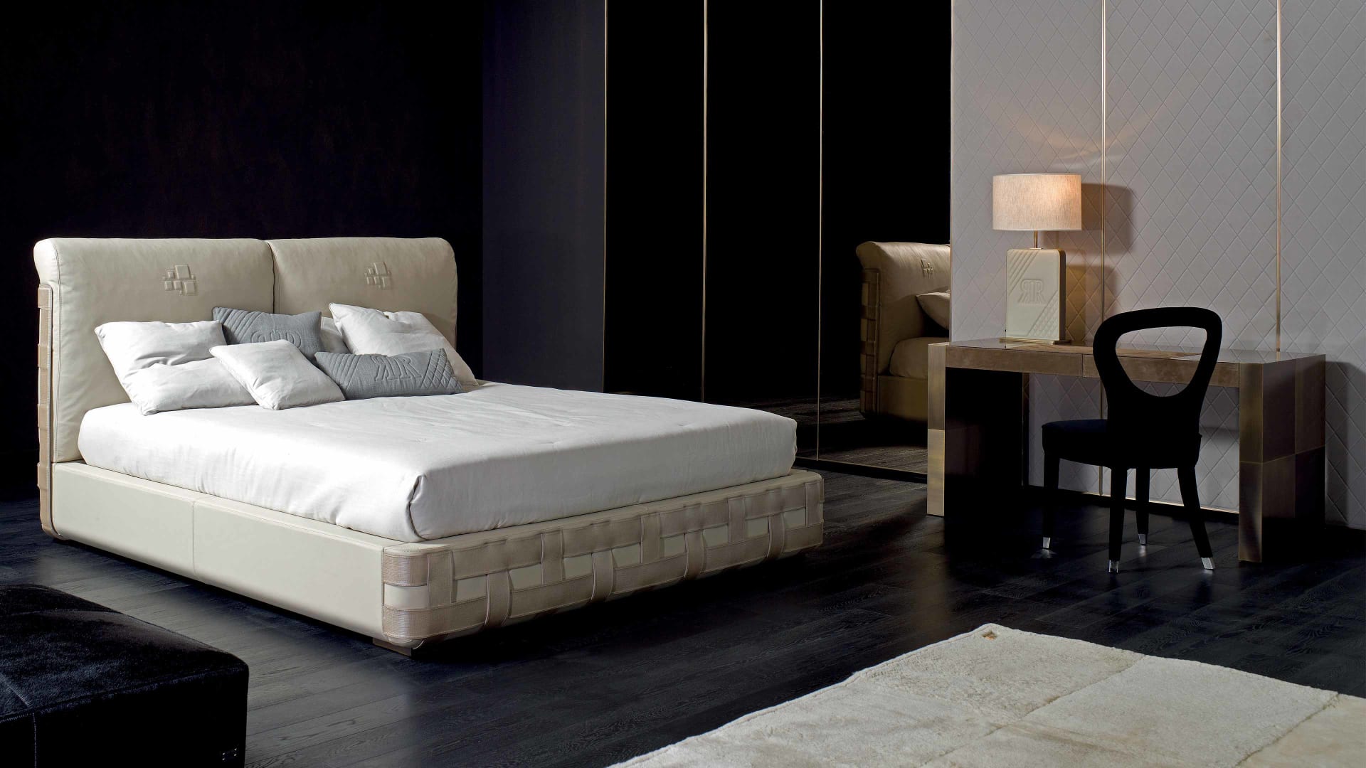 Braid bed | Rugiano. A luxurious bed featuring an intricately woven base and a high upholstered headboard, offering unparalleled comfort and modern elegance.