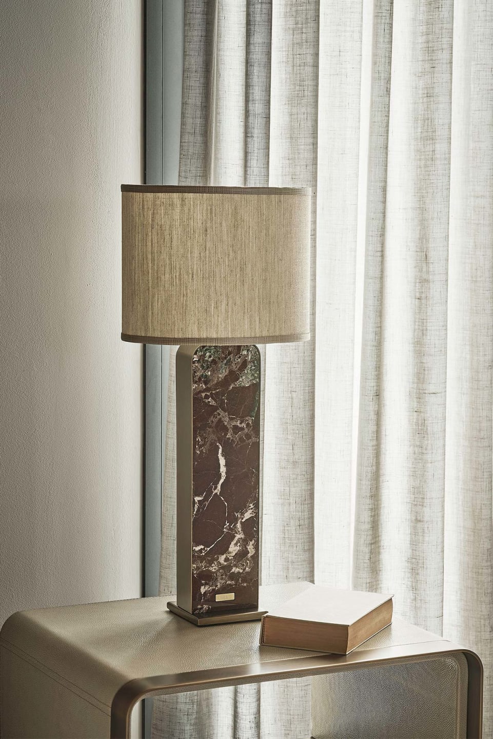 Bagutta bedside lamp | Rugiano. Exquisite lamps featuring bronze/steel frames, leather upholstery, and marble bases.
