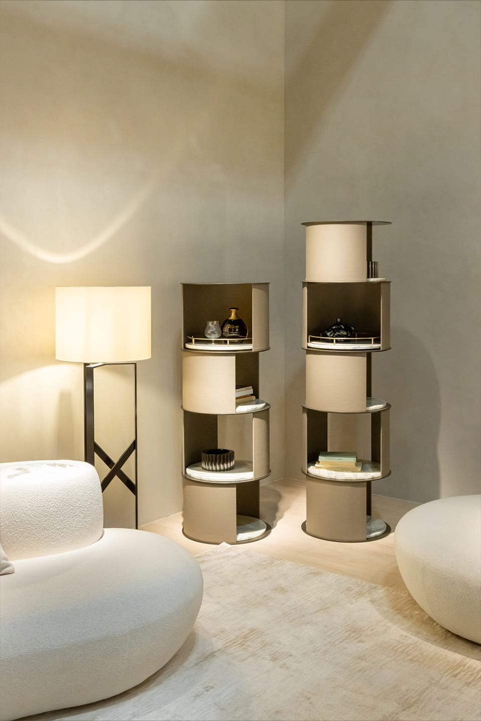 Floyd bookcase | Rugiano. Modular library with cylindrical design, marble shelves, and eco-leather finish.