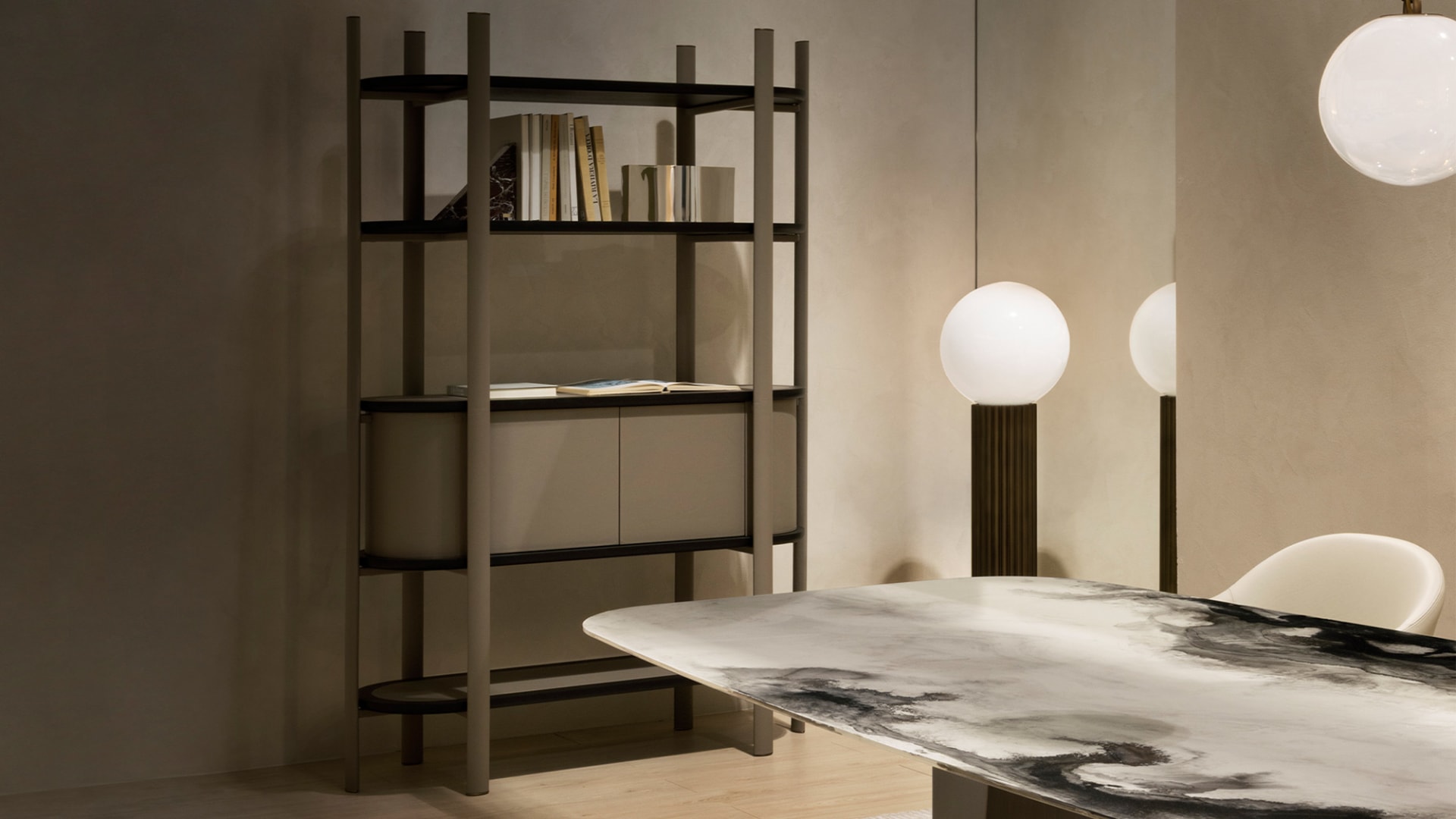 Coquette bookcase | Rugiano. Elegant Art Deco and Modern style bookcase with rounded forms, combining open shelves and closed compartments.