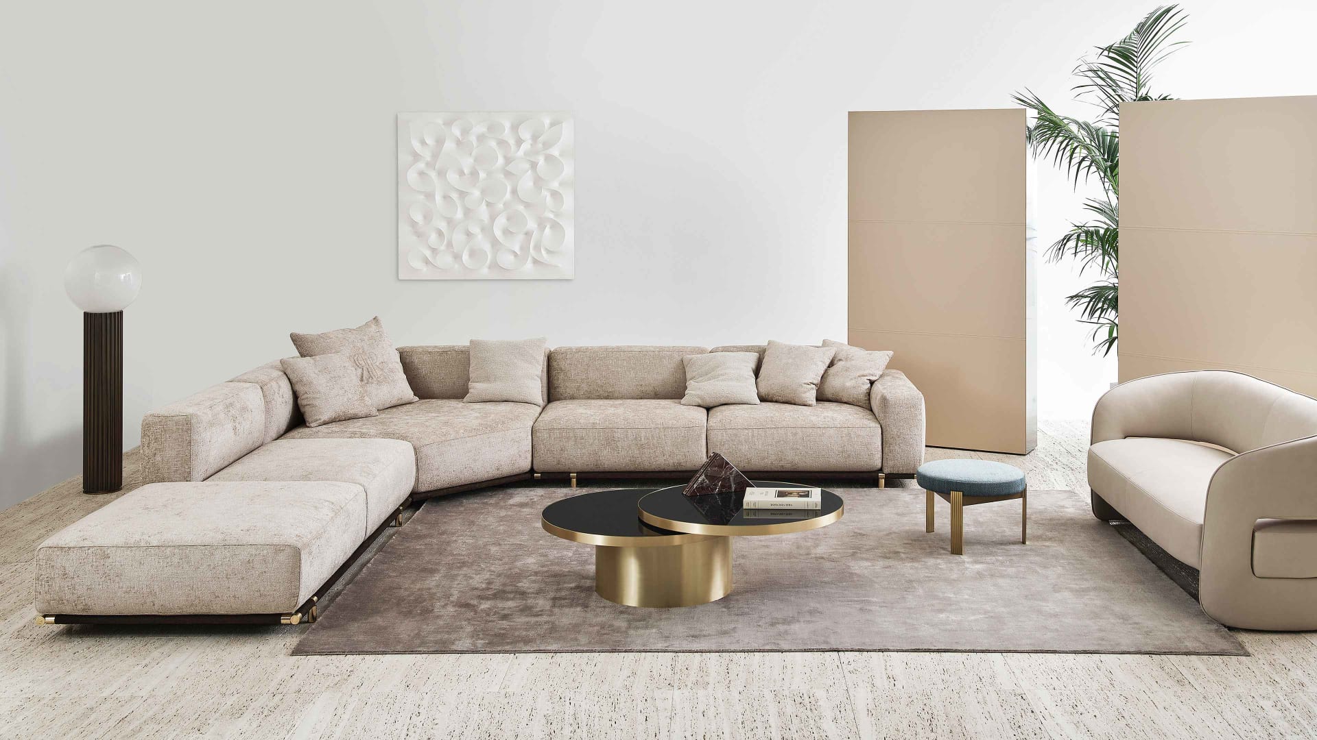 Boheme sofa | Rugiano. Luxurious leather sofa with metal base and elegant gold or bronze accents.