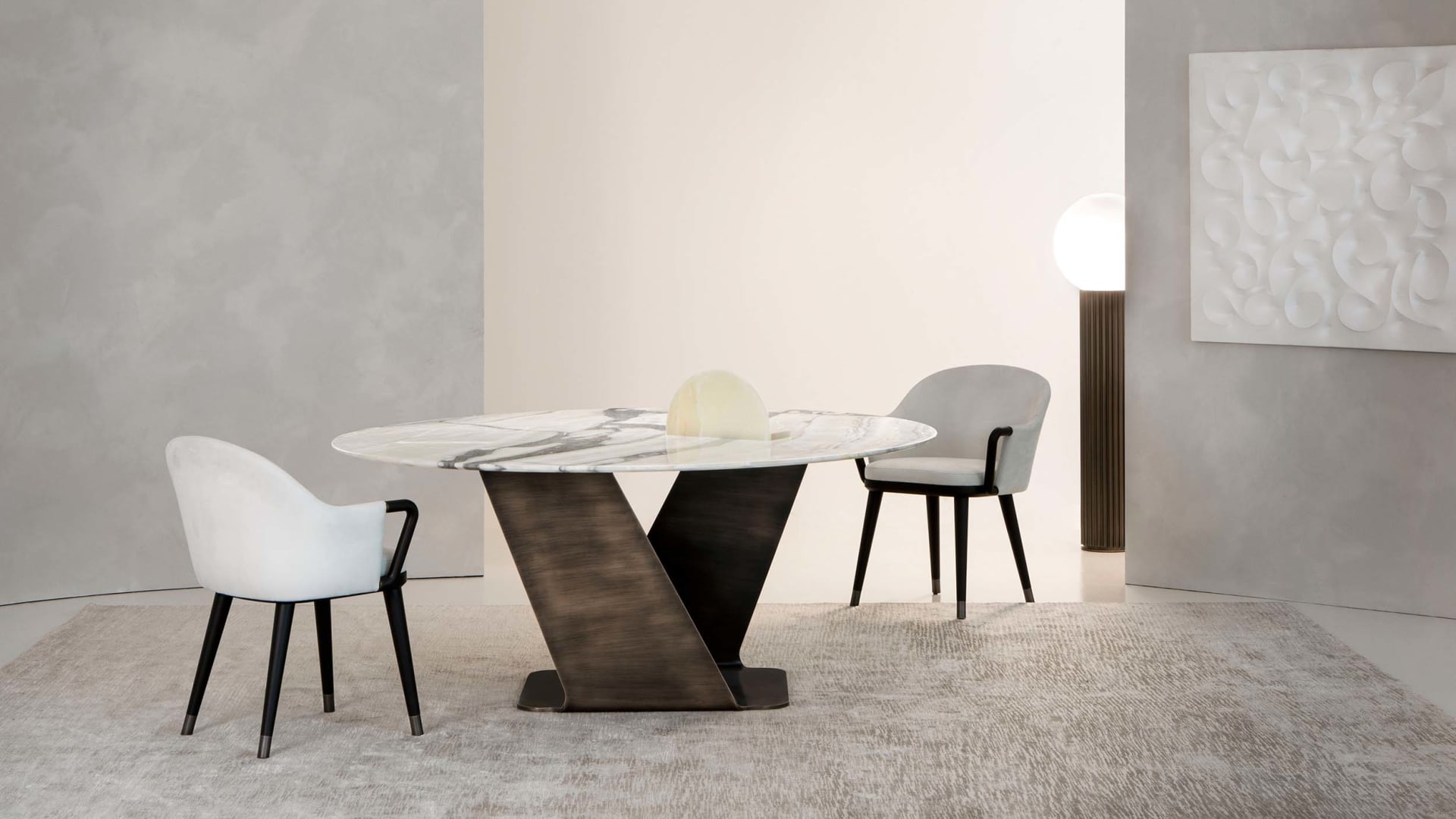 Wally Round table | Rugiano. Sculptural round table with natural stone top, blending artistic design with luxurious materials for a captivating focal point.