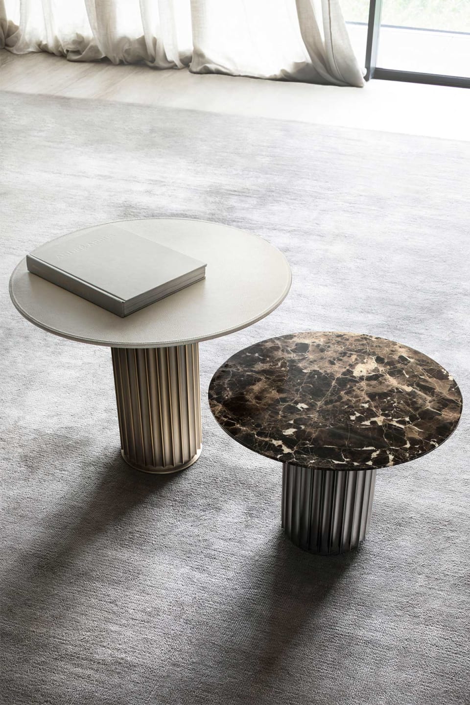 Liberty coffee table | Rugiano. Elegant coffee table with a distinctive column-like bronze-finished base and versatile round tops.