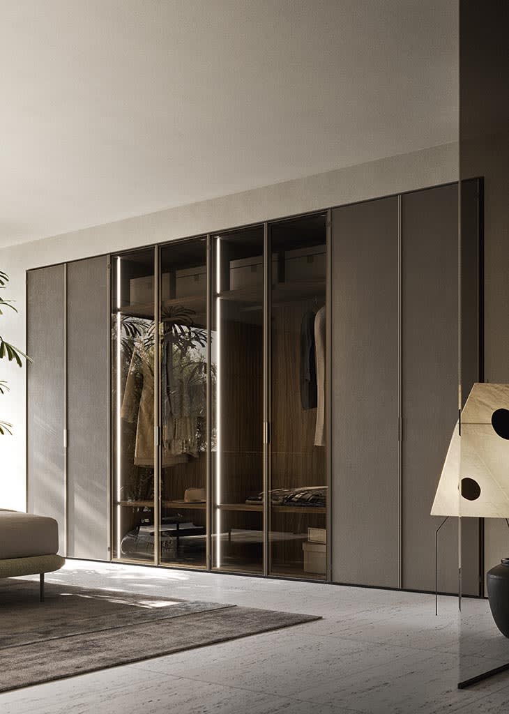 Pure closet | ALF Dafre. Elegant hinged door with clean lines for modern wardrobes and closets, ensuring seamless integration and functionality.