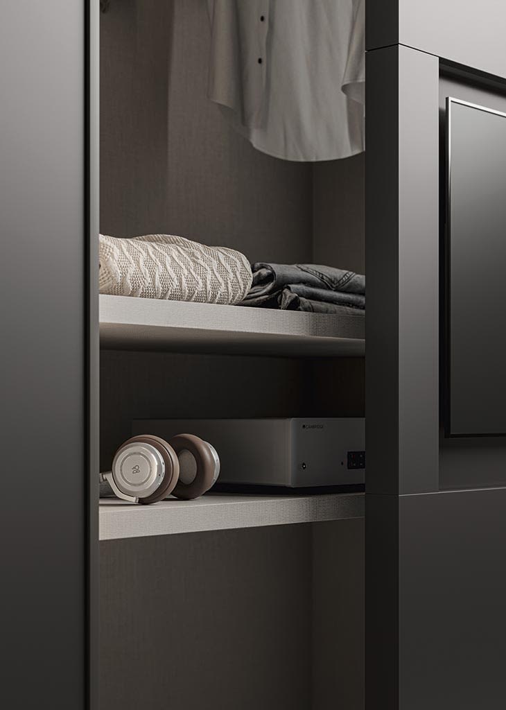 Television Sliding Door wardrobe | ALF Dafre. Elegant bedroom unit with sliding doors, discreetly housing a TV for a seamless modern interior.