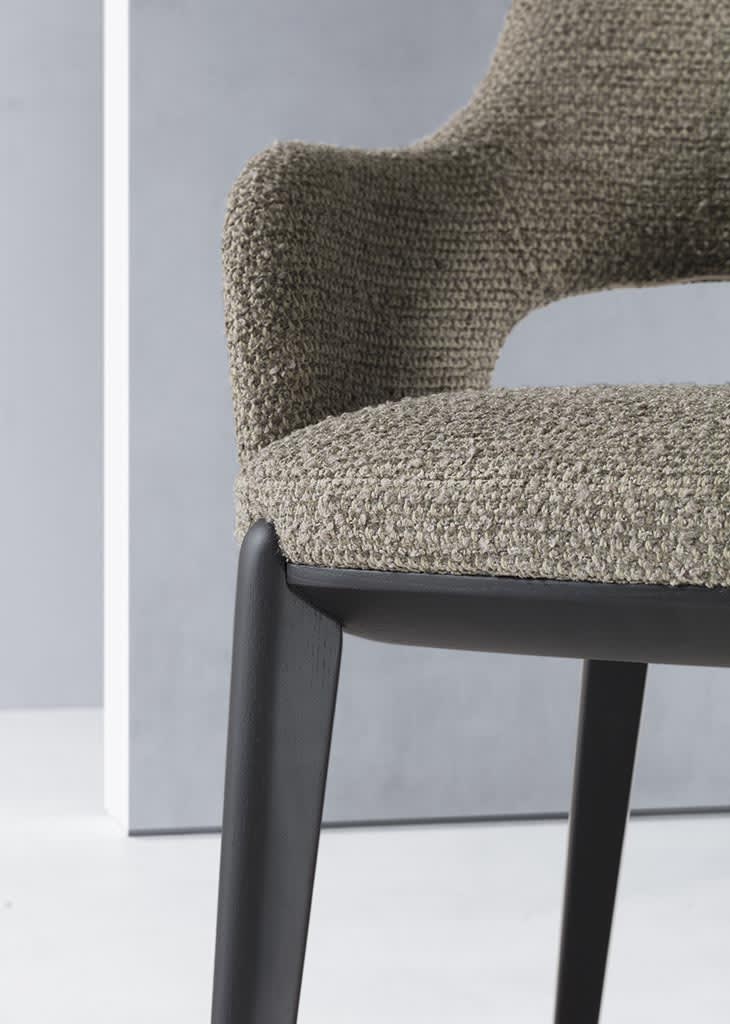 Tina chair | ALF Dafre. Elegant chair with a metal frame and soft upholstery, perfect for modern interiors.