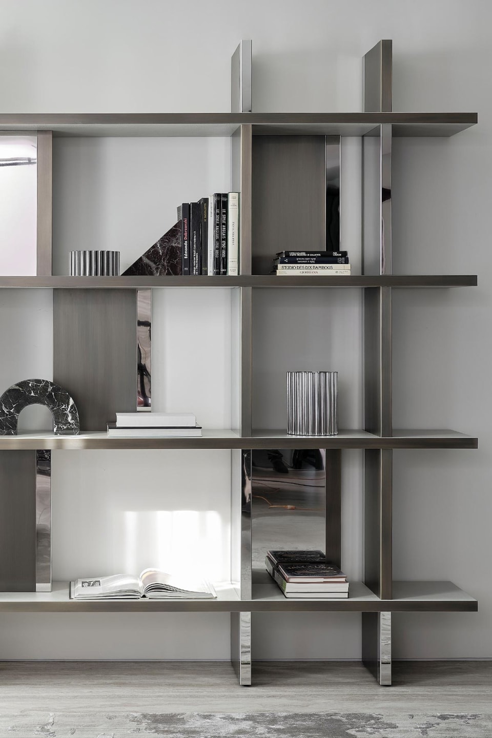 Asia High bookcase | Rugiano. Modular luxury shelving system with metal or upholstered structure and leather shelves, featuring optional compartment doors.