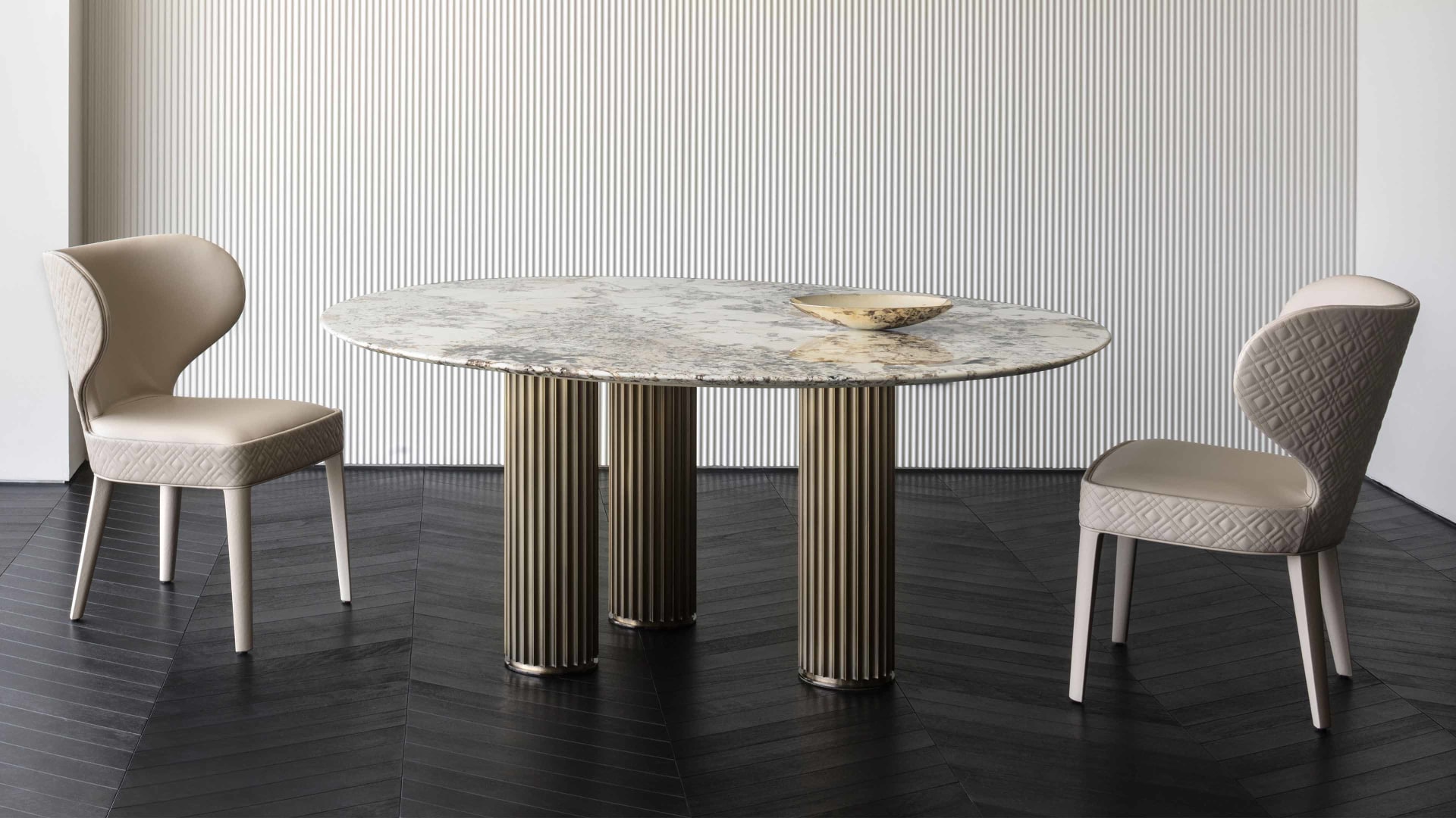 Aida armchair | Rugiano. An exquisitely designed upholstered chair with an optional high back and elegant wooden legs, offering versatile comfort.