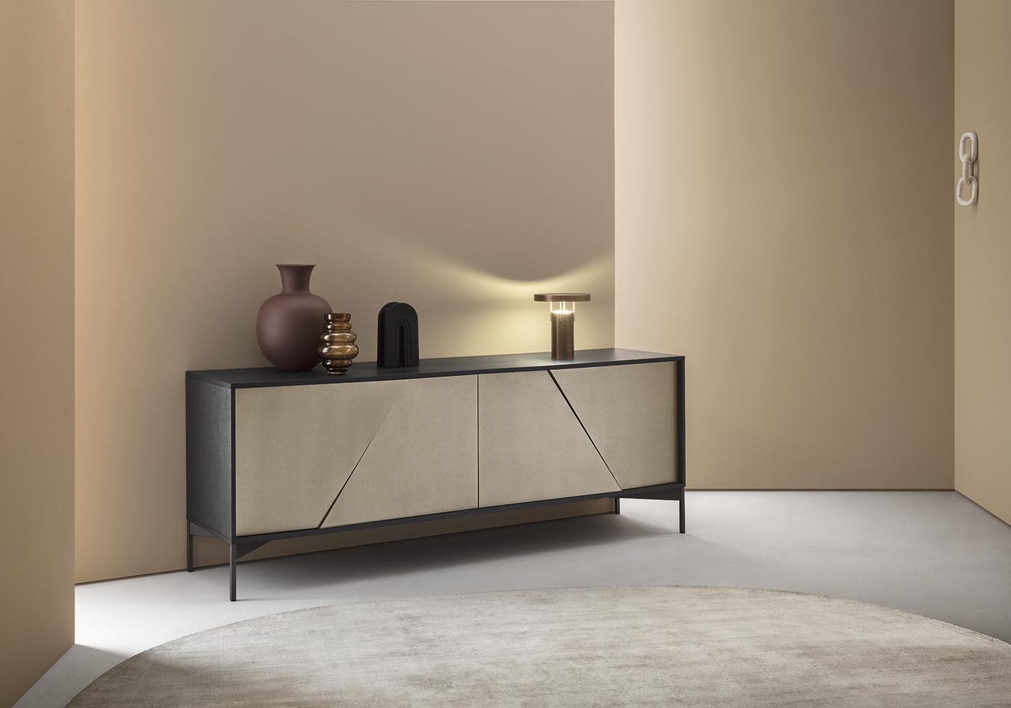 Kendo sideboard | ALF Dafre. Sideboard with unique geometric doors creating a light and shadow effect, available in various finishes.