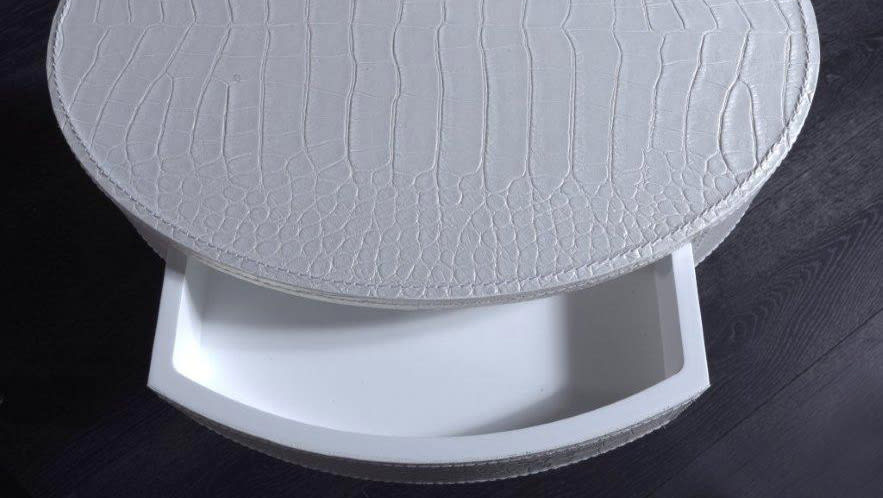 Just side table | Rugiano. Elegant side table with a metal base and unique top, perfect for modern interiors.