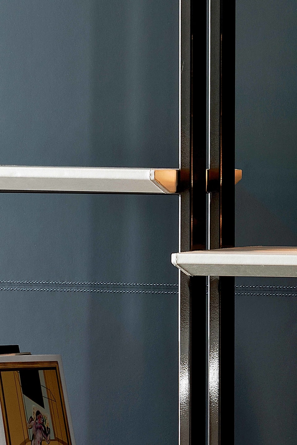 Frame-A bookcase | Rugiano. Exquisite self-standing bookshelf with metal structure and luxurious leather or marble shelves, offering versatile storage.