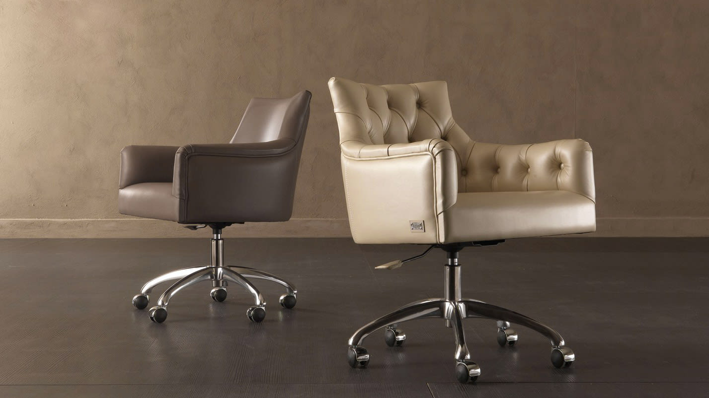 Itaca office chair | Rugiano. Adjustable office chair with capitonné or smooth upholstery options, offering supreme comfort and style.