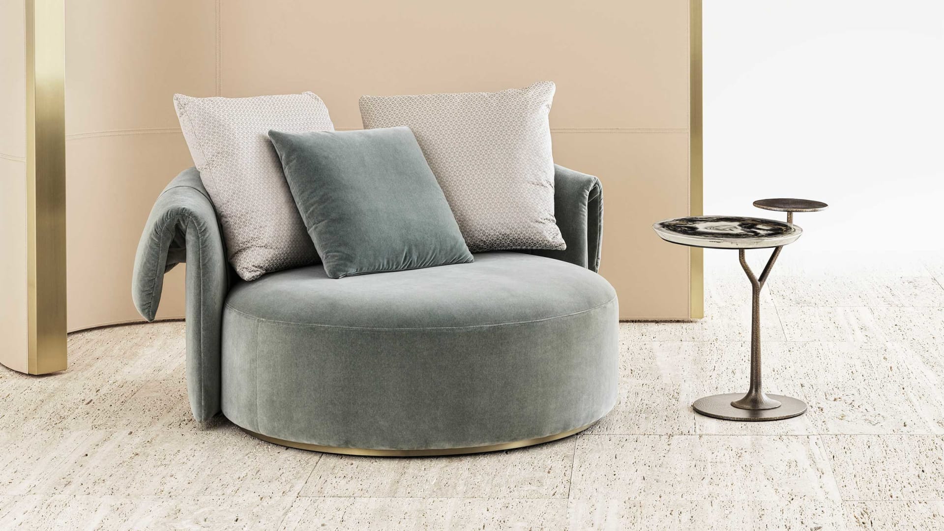 Manta pouf | Rugiano. Luxury velvet pouf with a unique curved armrest and golden base, a perfect accent for elegant interiors.