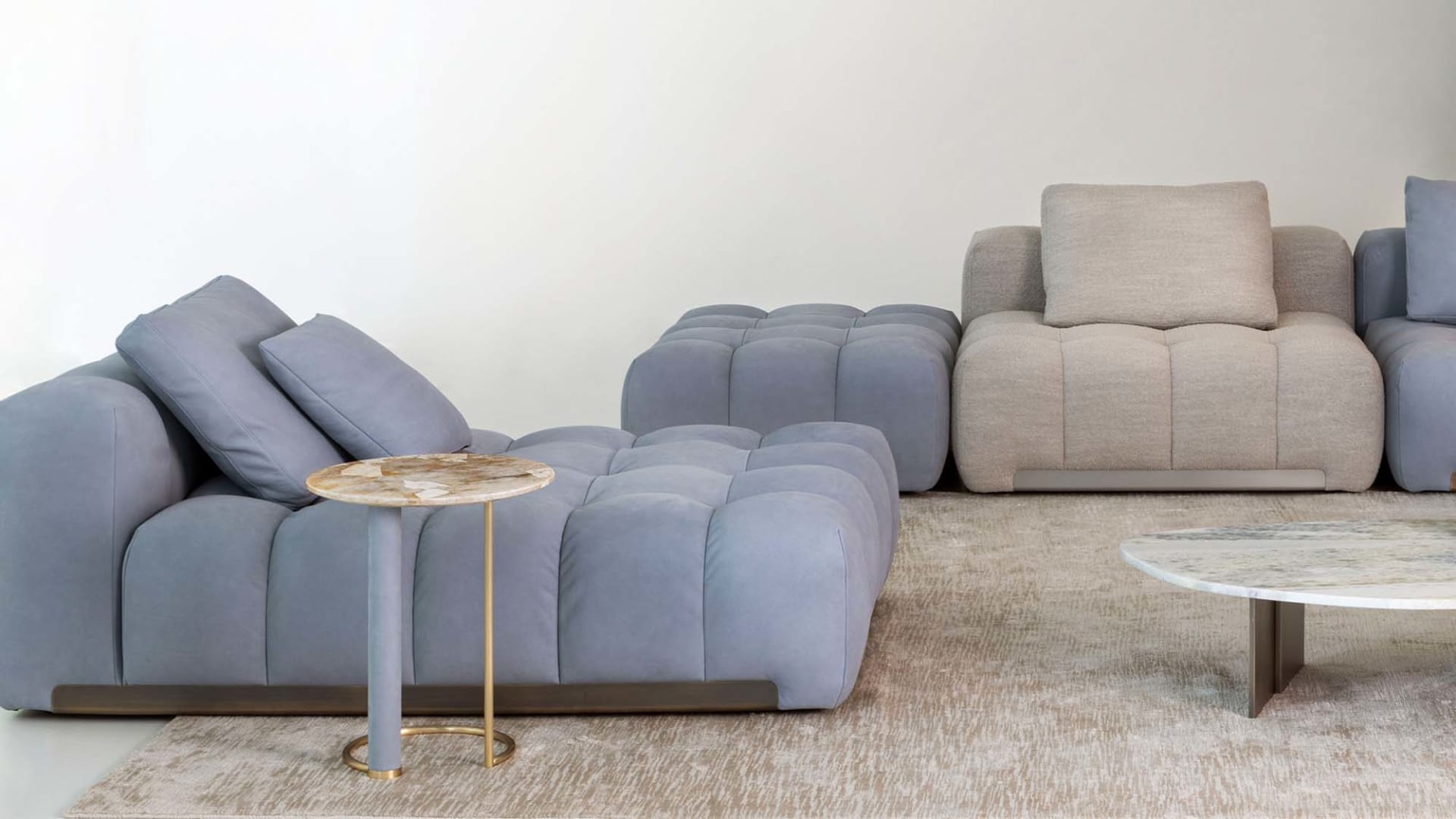 Opale coffee table | Rugiano. Elegant tables with characteristic covered legs and tops in marble or leather, perfect for modern interiors.