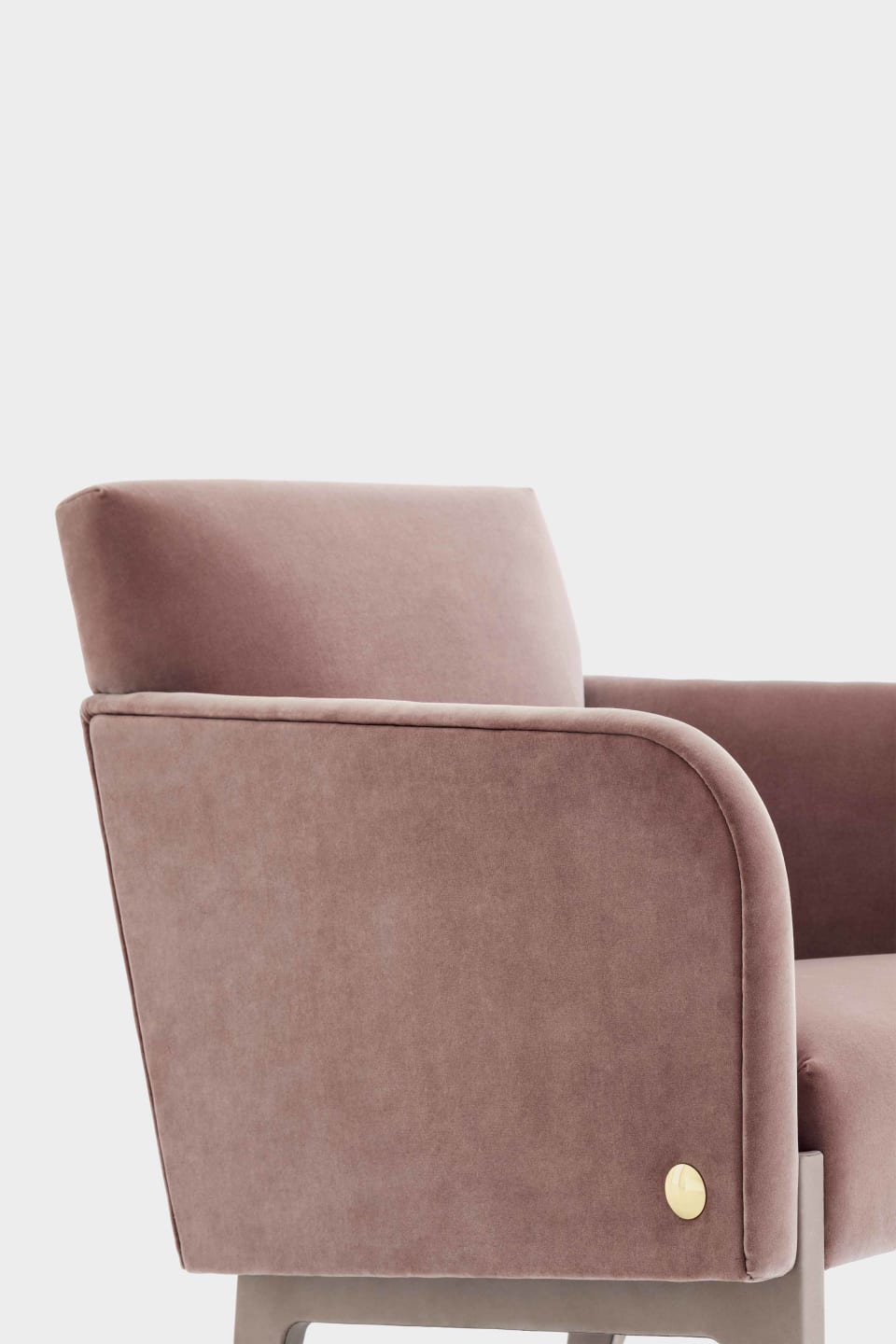 Agata armchair | Rugiano. Elegant armchair with upholstered legs and refined bronze details, offering luxurious comfort and sophisticated style.