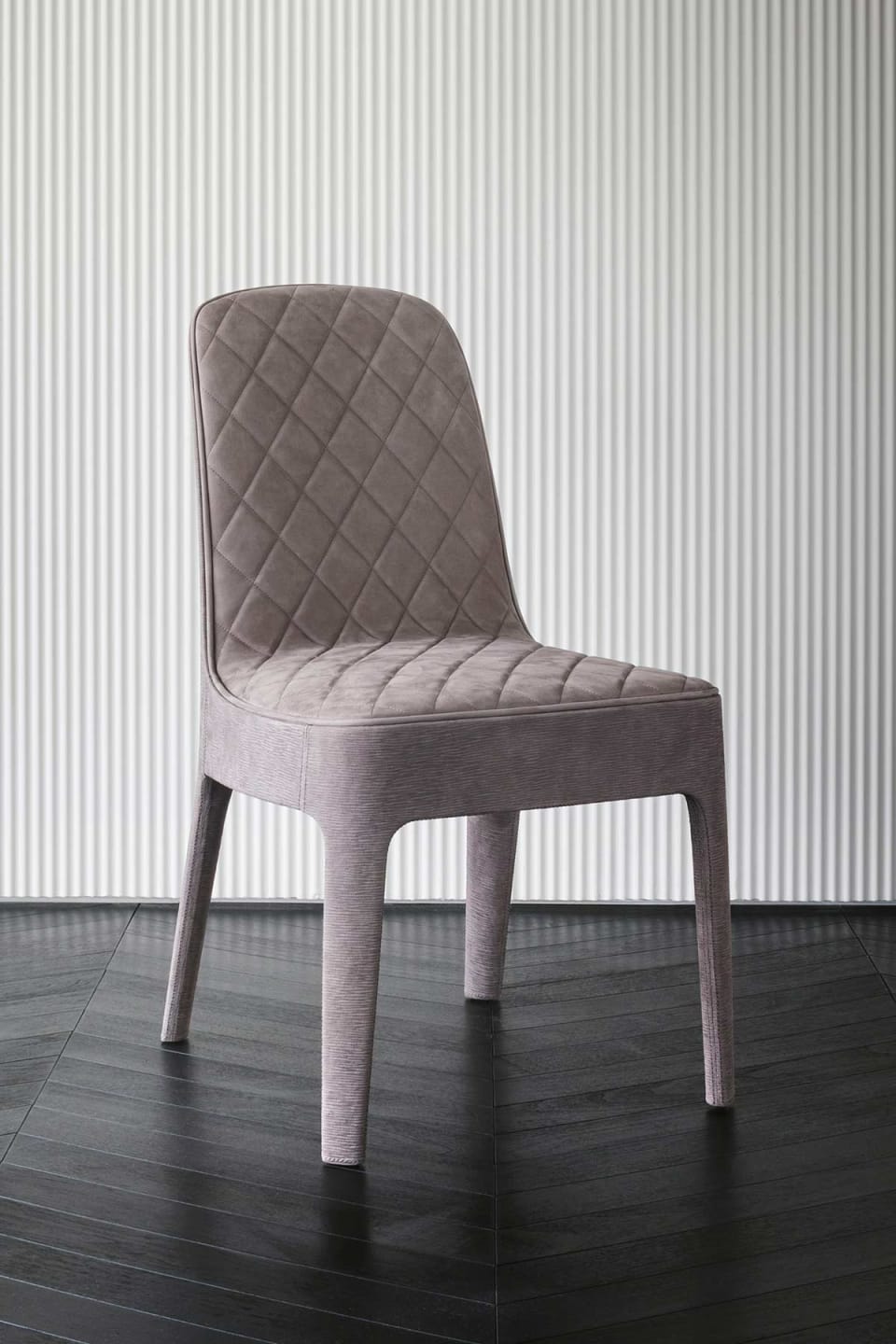 Aria chair | Rugiano. Fully upholstered chair with elegant curves, offering supreme comfort and versatile design for any contemporary interior.