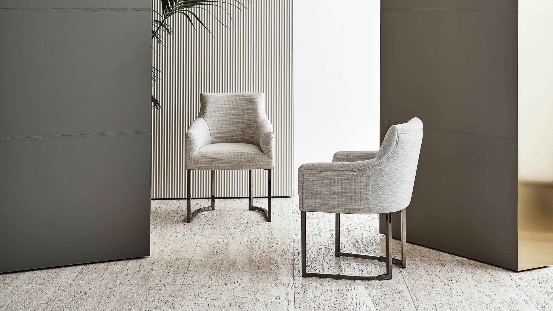 Itaca armchair | Rugiano. Luxuriously upholstered chair with elegant metal legs, offering refined comfort and bespoke finishes for any sophisticated interior.