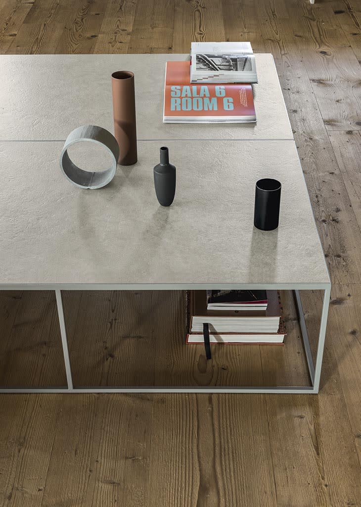Kobe side table | ALF Dafre. Sleek occasional table blending painted metal and a wooden top, perfect for modern interiors.