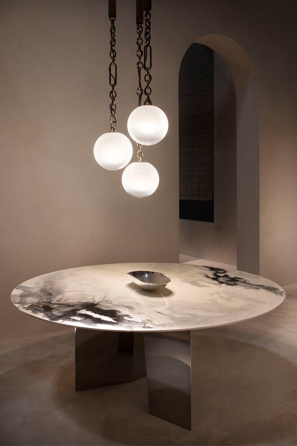 Blanco table | Rugiano. Sculptural table with a unique glass tabletop, rounded edges, and an expressive lacquered base, perfect for modern interiors.