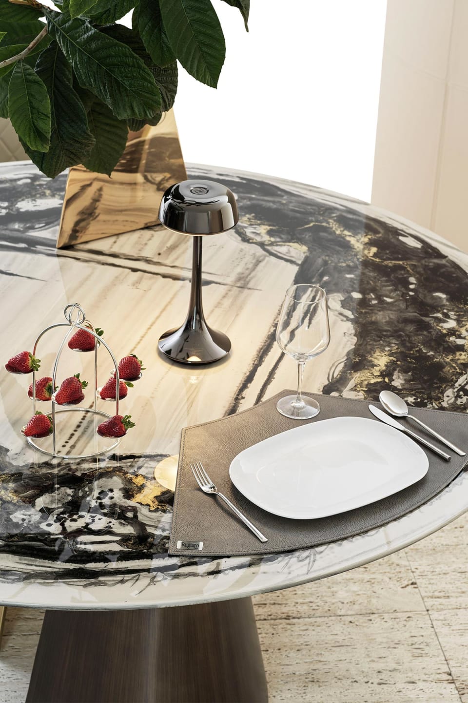 Absolute table | Rugiano. A luxurious dining table featuring a sculptural metal base with contrasting finishes and versatile top options.