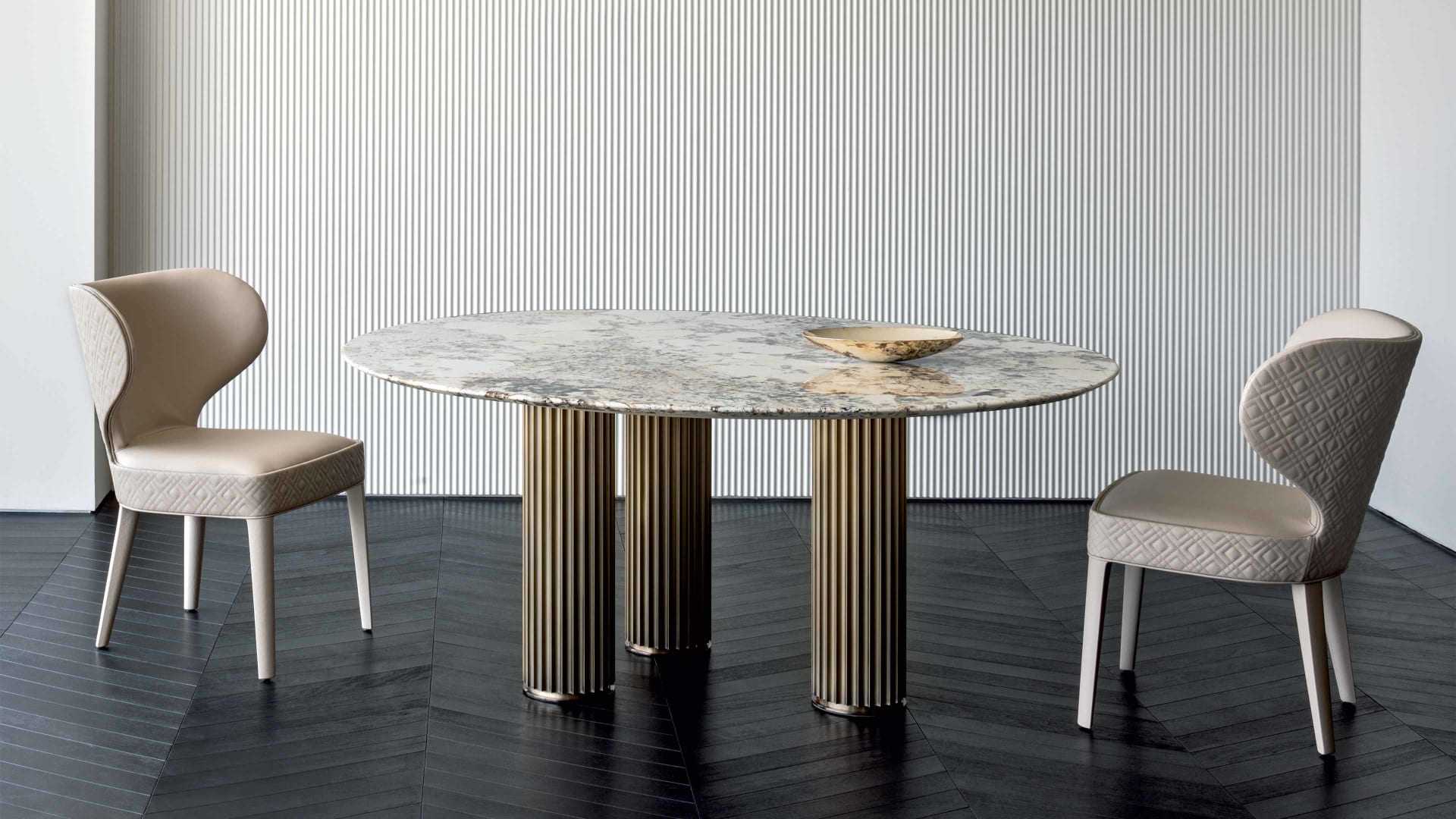 Liberty3 table | Rugiano. Elegant dining table with a striking column-like aluminium base and luxurious marble or hand-painted top.