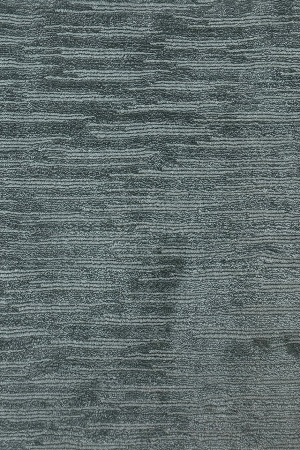 Line Light Blu rug | Rugiano. Exclusive wool rug with abstract, striped pattern in deep Petrol Blue for modern interiors.