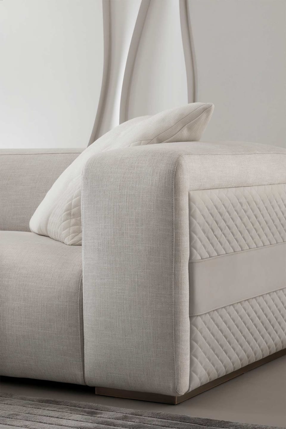 Freud armchair | Rugiano. Modular sofa and armchair range with distinctive baguette stitching and integrated side tables, offering ultimate comfort and design flexibility.