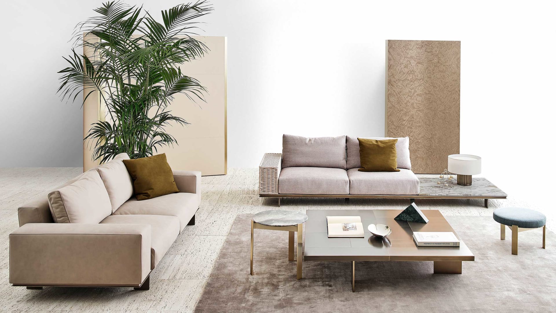 Memphis Intreccio sofa | Rugiano. Luxurious sofa with linear metal base, elegant leather details, and integrated marble coffee tables for versatile compositions.