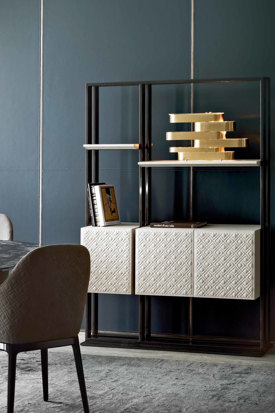 Frame-A bookcase | Rugiano. Exquisite self-standing bookshelf with metal structure and luxurious leather or marble shelves, offering versatile storage.