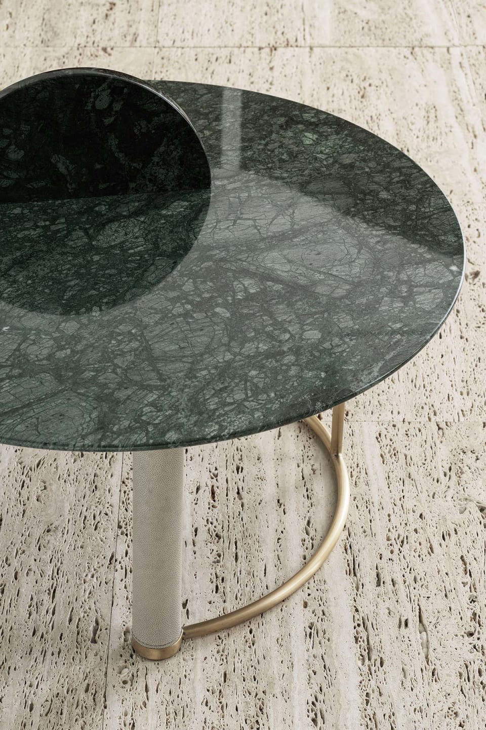 Opale coffee table | Rugiano. Elegant tables with characteristic covered legs and tops in marble or leather, perfect for modern interiors.