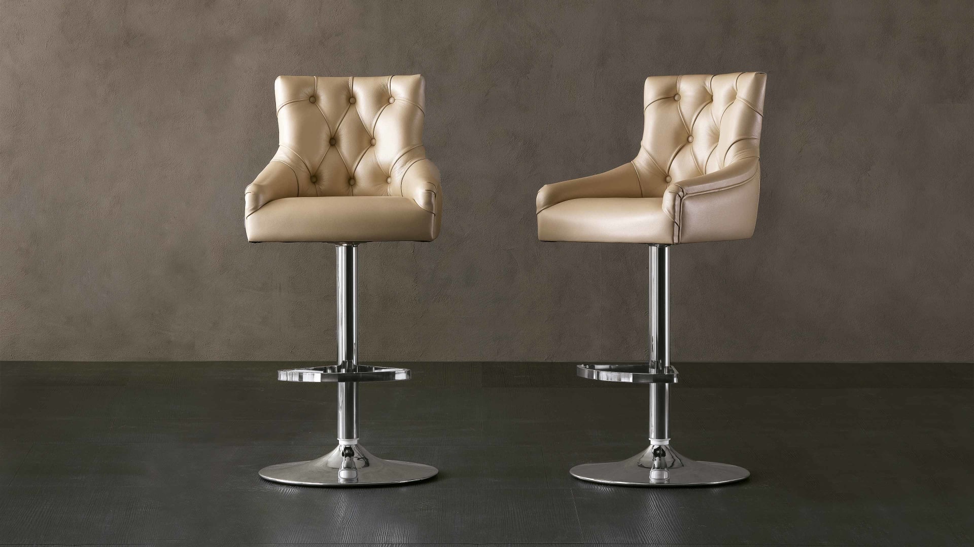 Itaca bar chair | Rugiano. Elegant adjustable height bar stool with tufted upholstery, perfect for modern interiors.