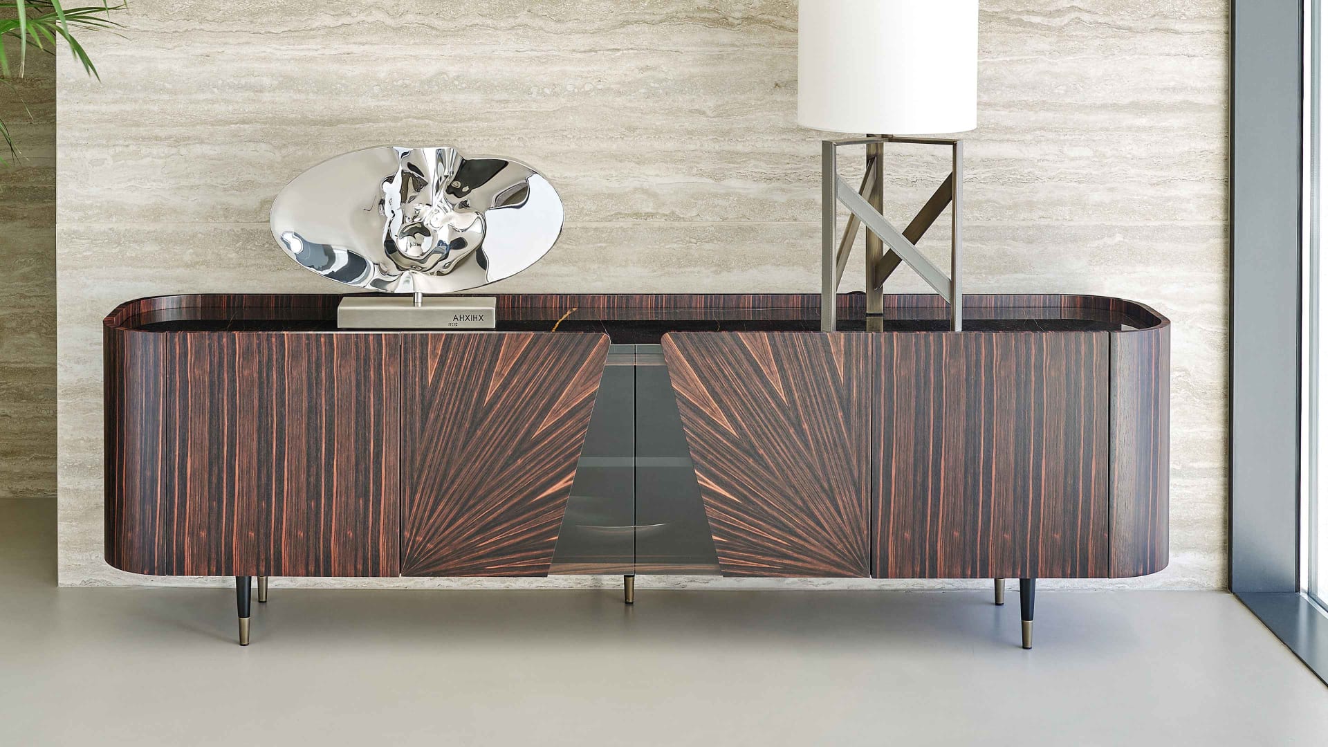 Frak sideboard | Rugiano. Exquisite sideboard with ebony or leather, marble top, and elegant glass details.