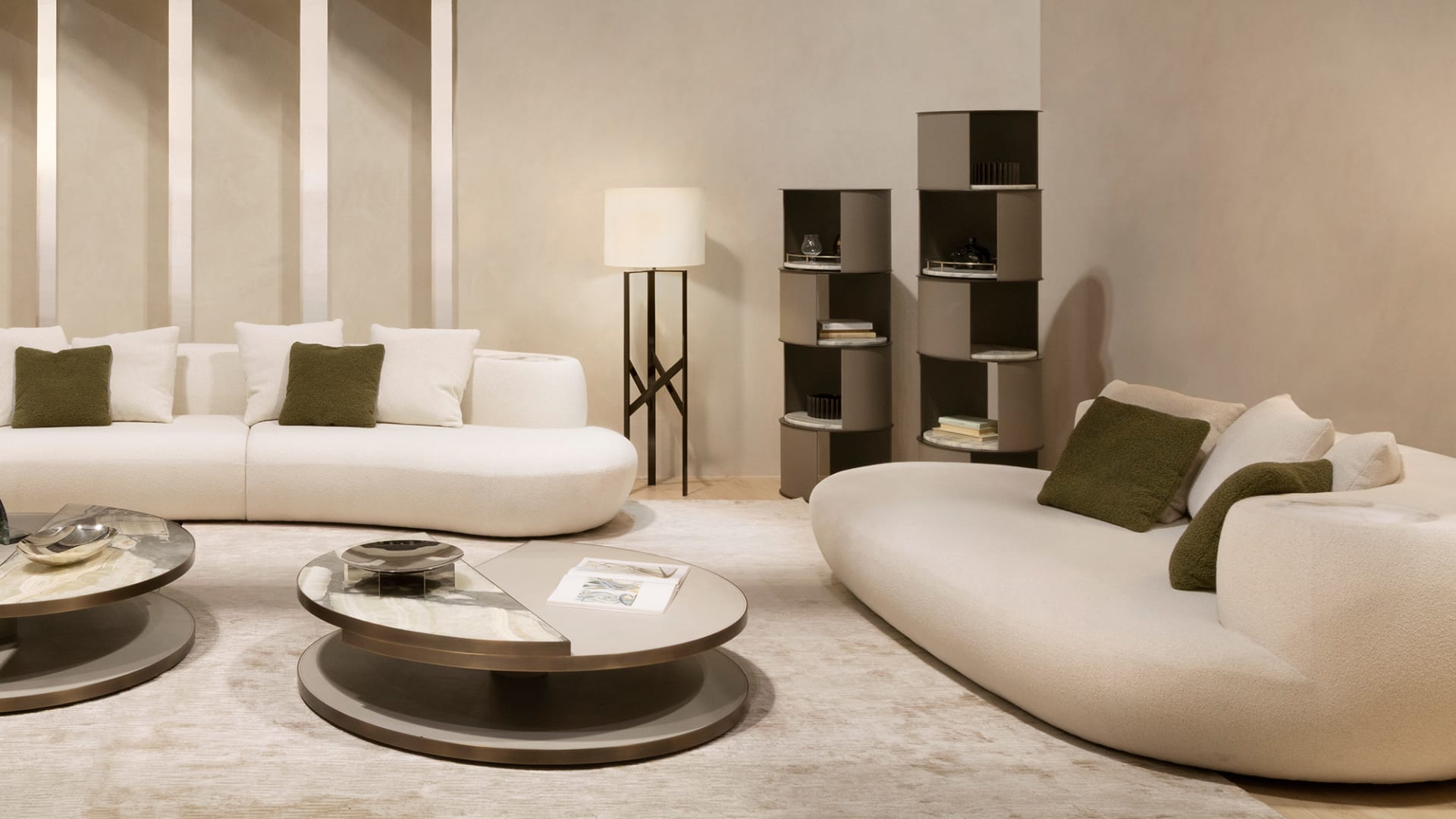 Floyd bookcase | Rugiano. Modular library with cylindrical design, marble shelves, and eco-leather finish.