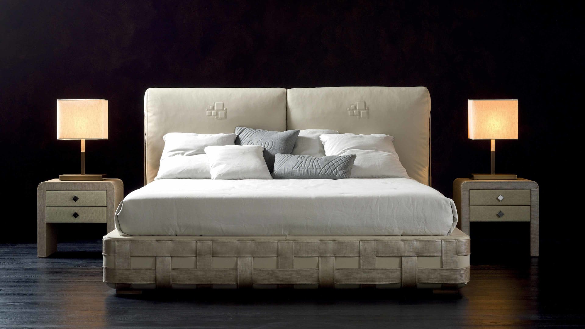 Braid bed | Rugiano. A luxurious bed featuring an intricately woven base and a high upholstered headboard, offering unparalleled comfort and modern elegance.